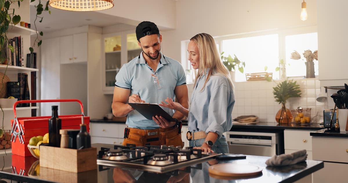 Accounting for home services contractors — contractor reviewing an estimate with a homeowner